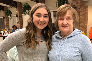 Mead, Lindsey with another person